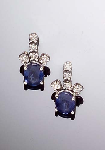 A pair of sapphire and diamond earrings,