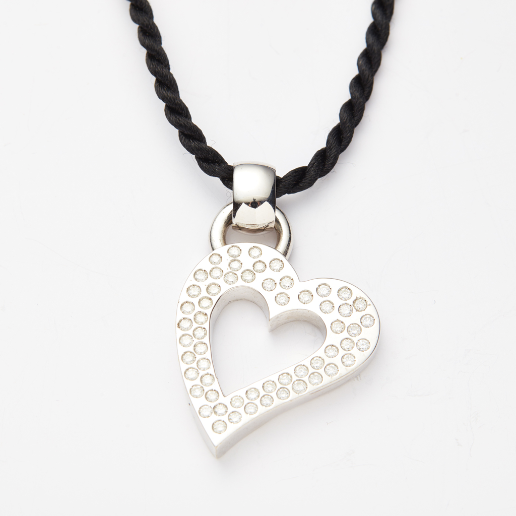 A contemporary diamond set pendant