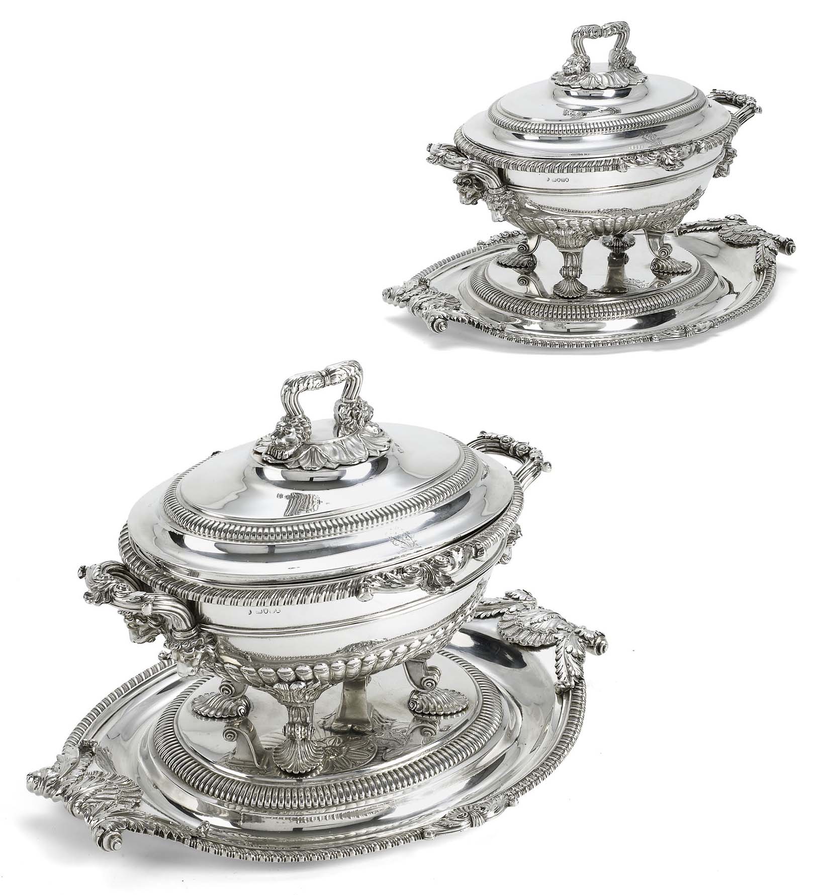 A fine pair of George III soup tureens, covers, liners and stands