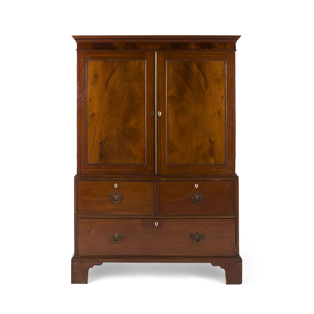 LATE GEORGE III SMALL MAHOGANY LINEN PRESS