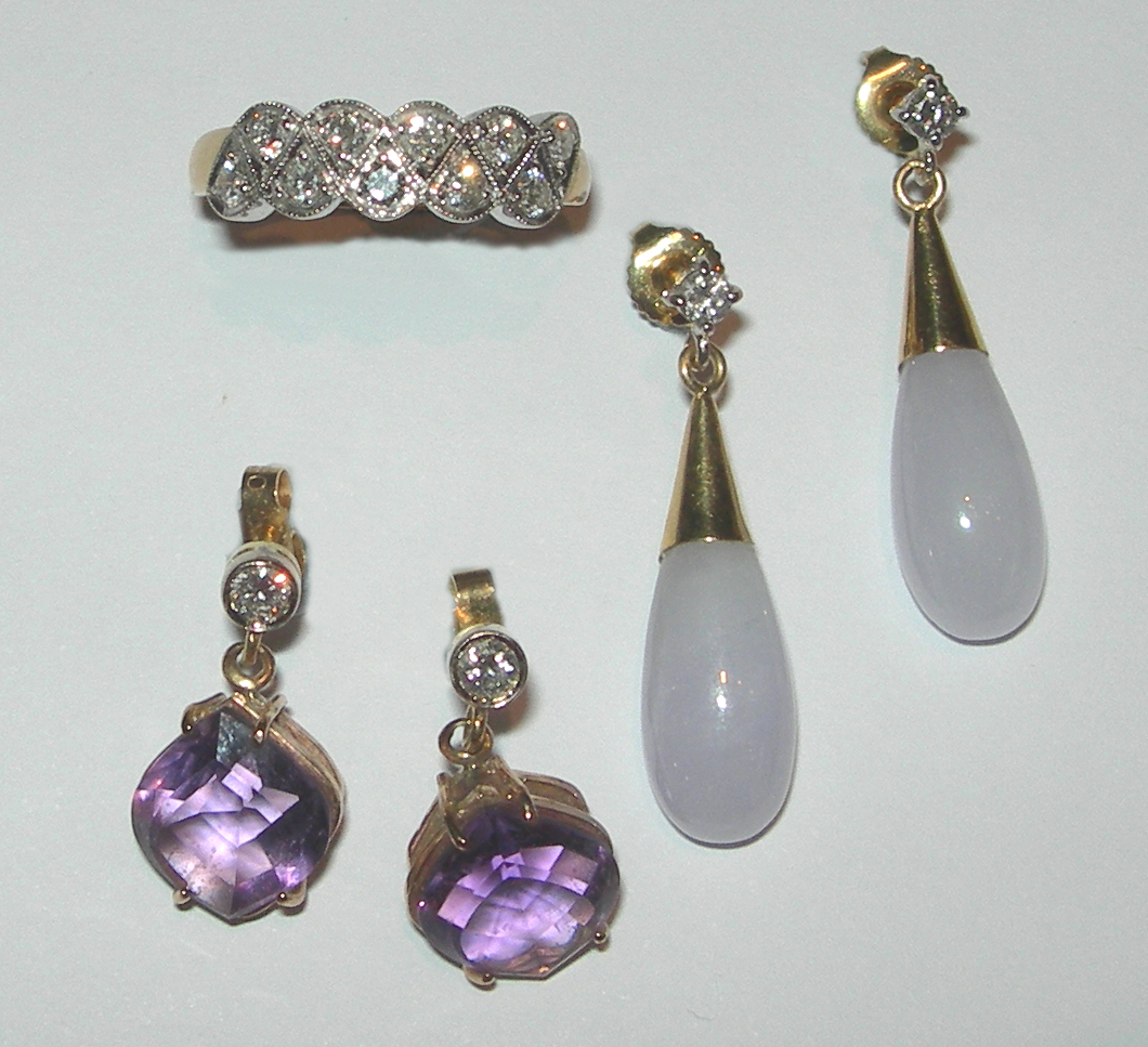 A pair of 18ct gold mounted amethyst and diamond pendant earrings,