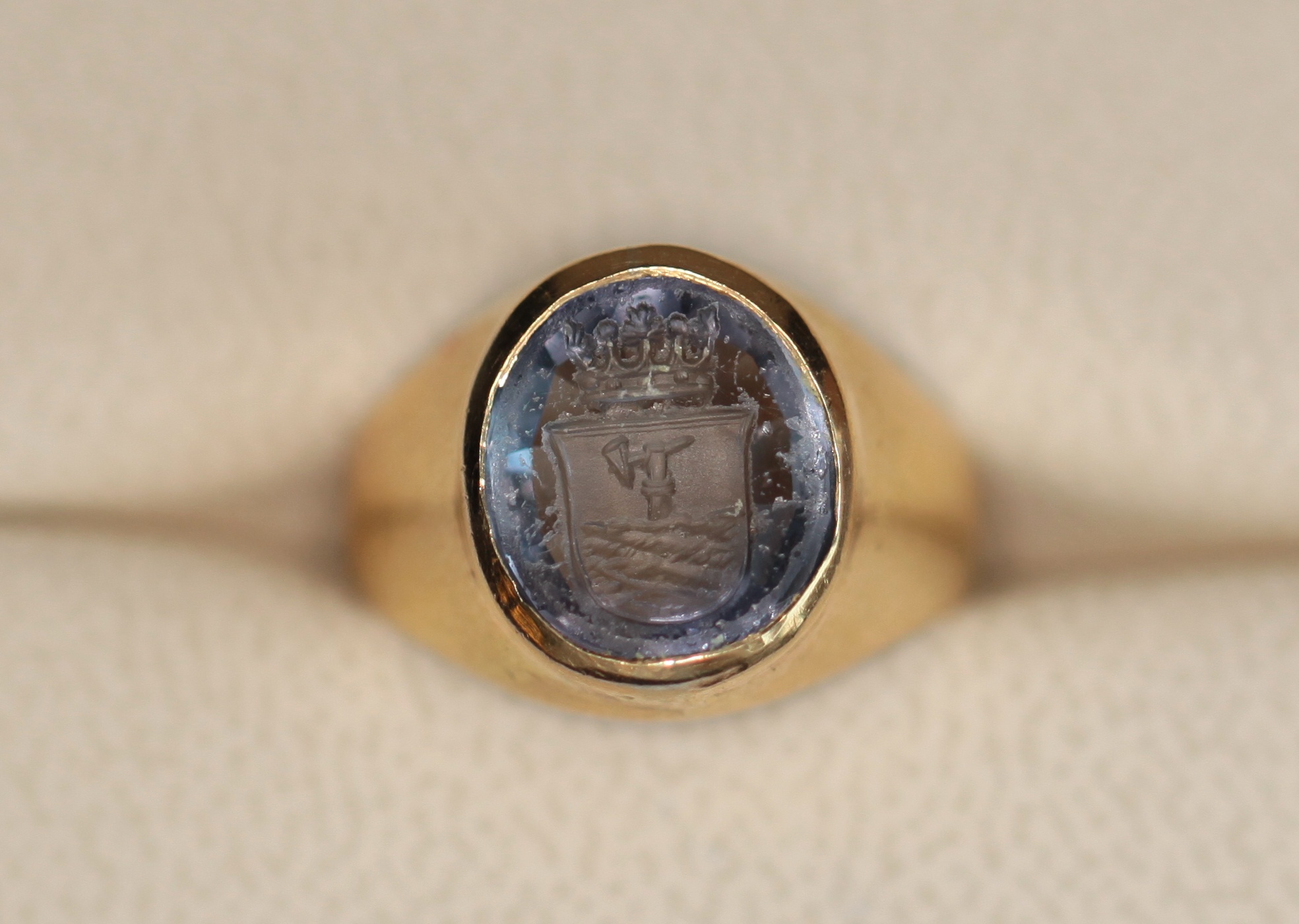 An intaglio set signet ring