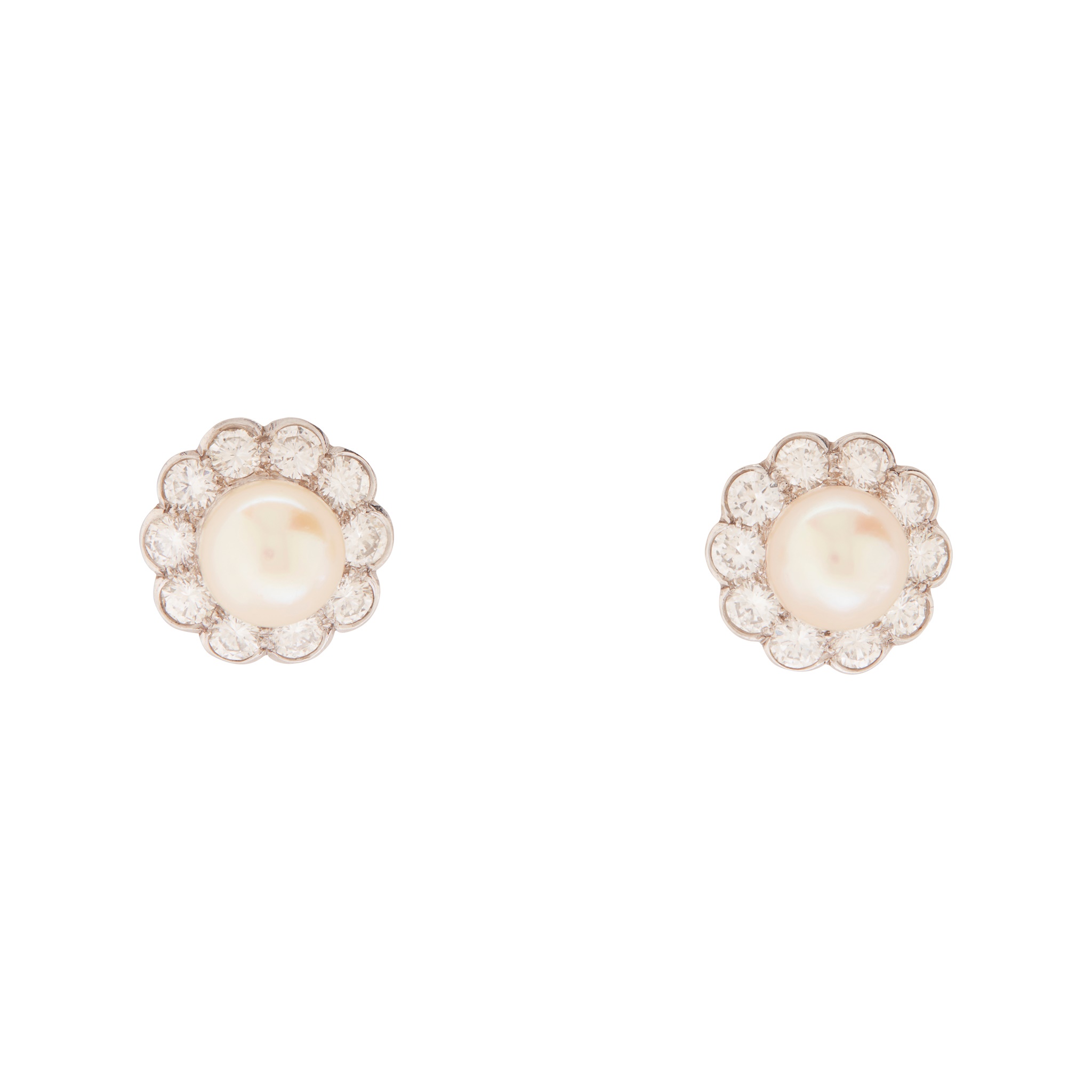 A pair of pearl and diamond cluster earrings