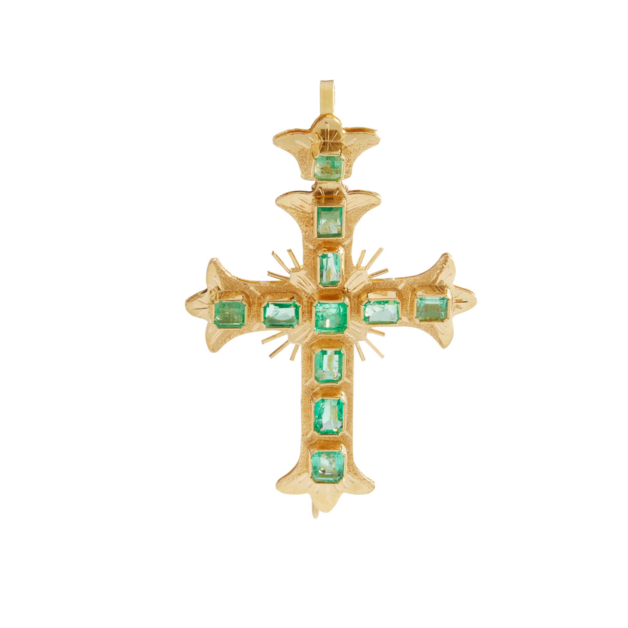 An emerald cross pendant