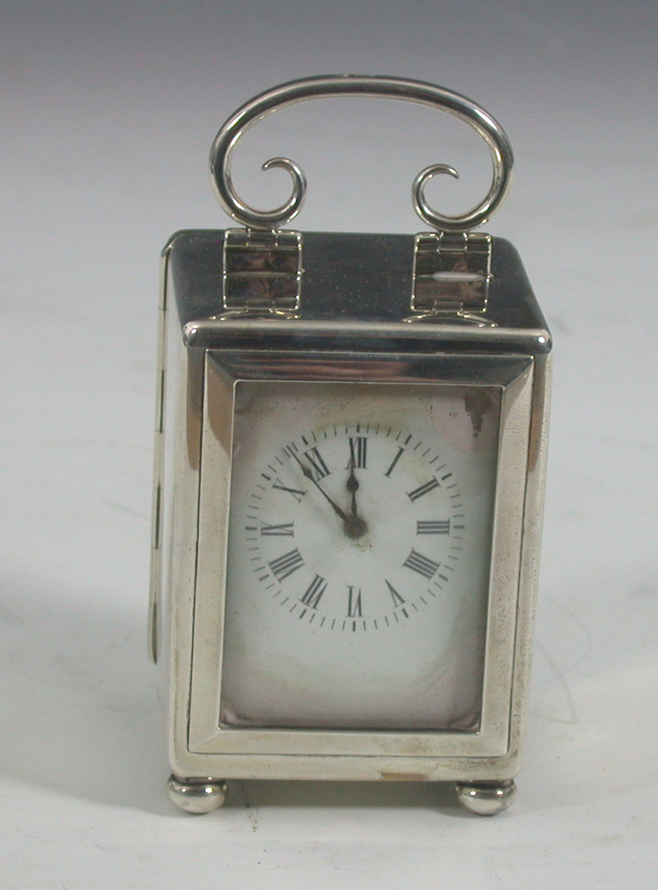 A late Victorian miniature carriage clock