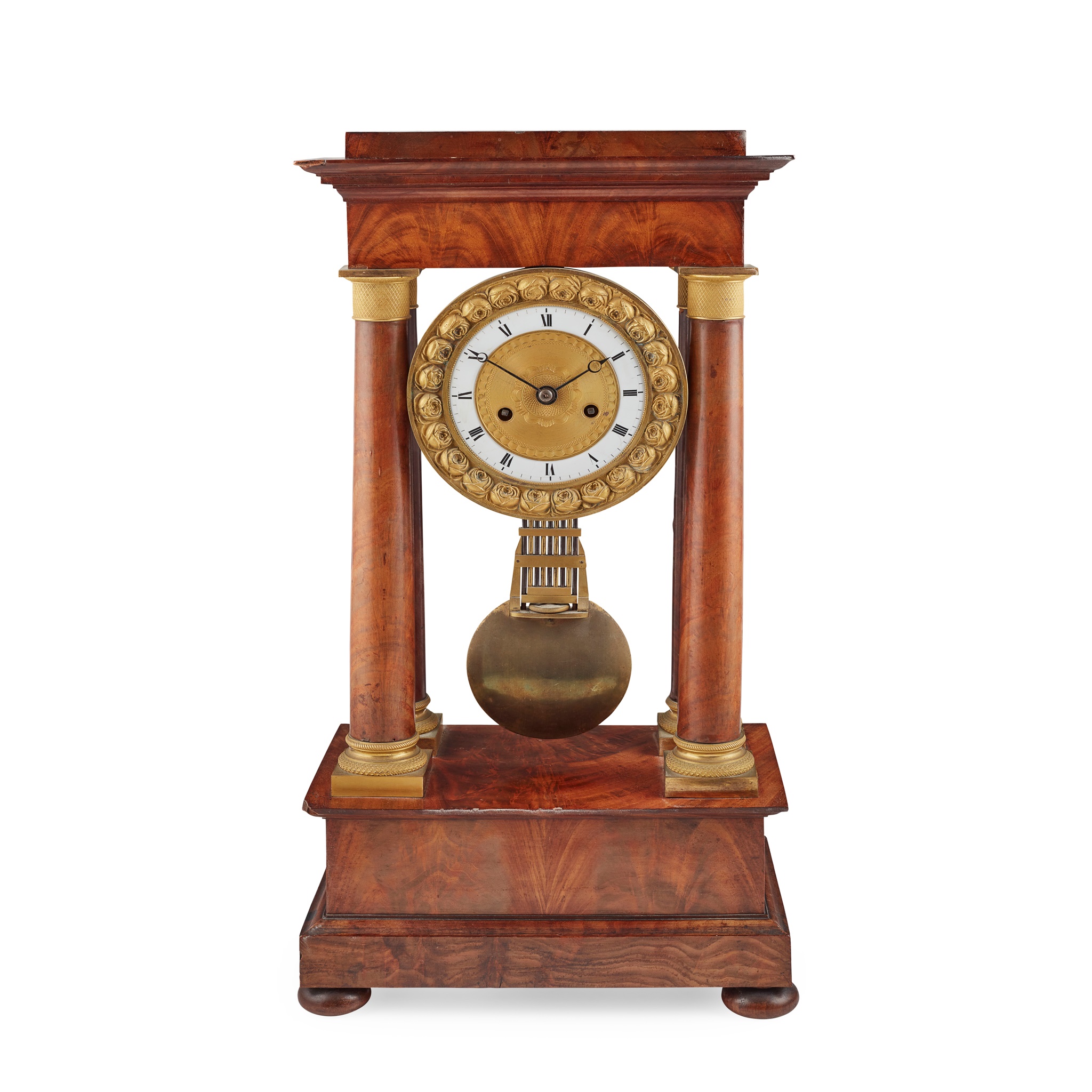 CHARLES X MAHOGANY AND GILT METAL PORTICO CLOCK