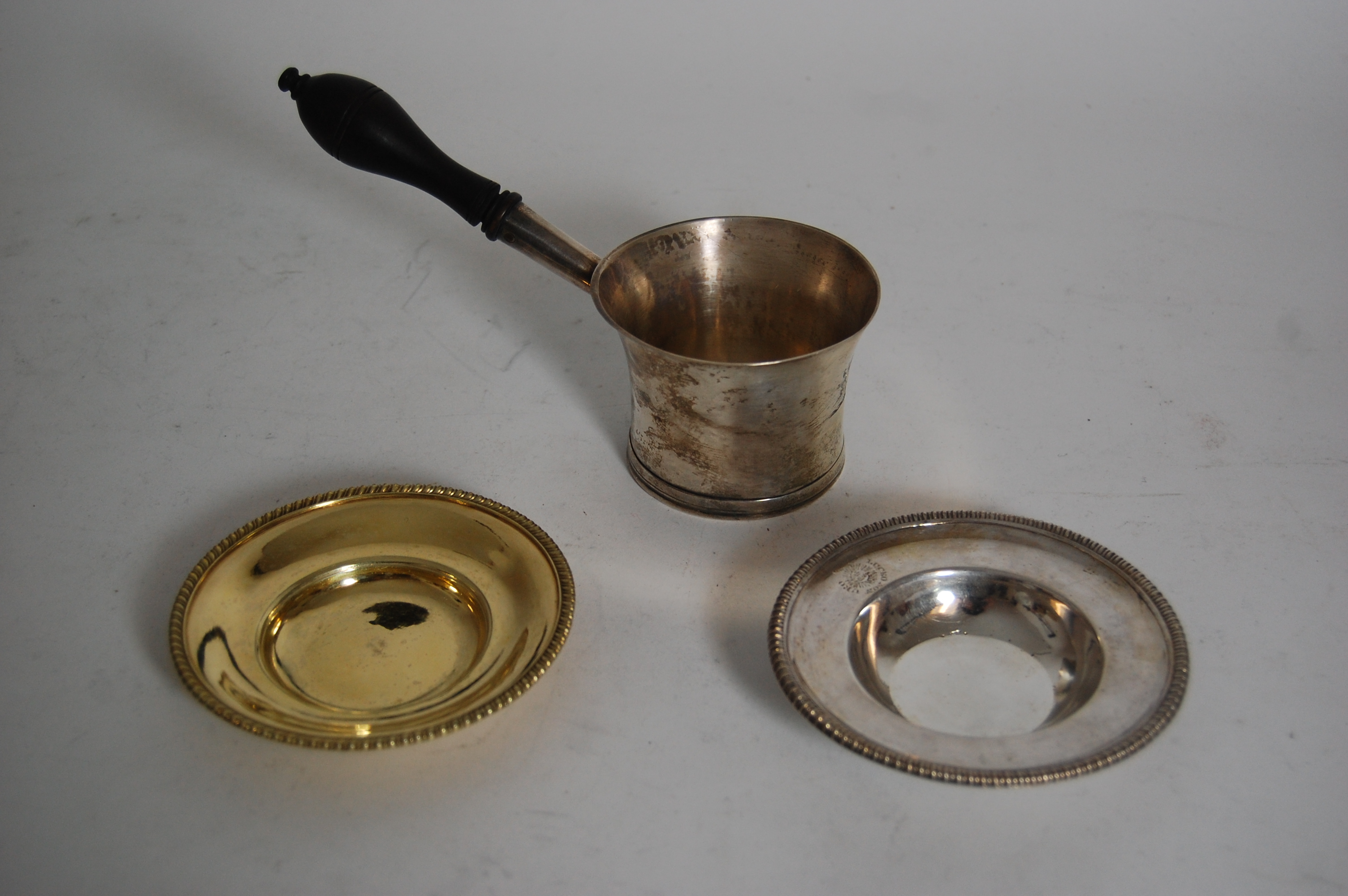 A matched set of six George III silver gilt dishes