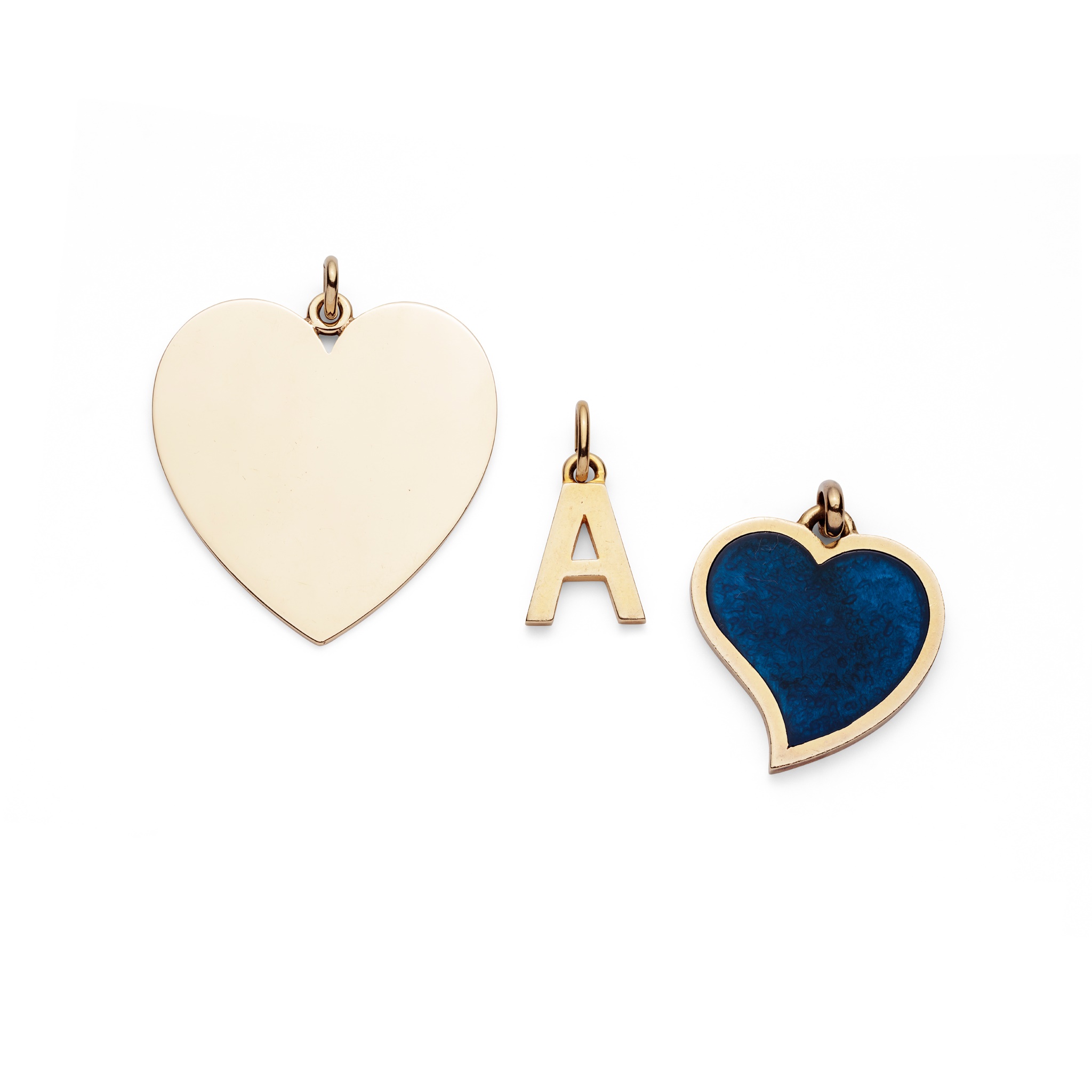 A pendant necklace, by Gucci and a pendant by Tiffany & Co.