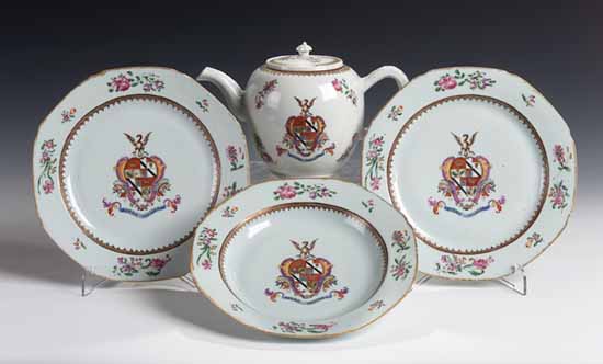 A pair of Chinese 18th century famille rose armorial octagonal meat plates