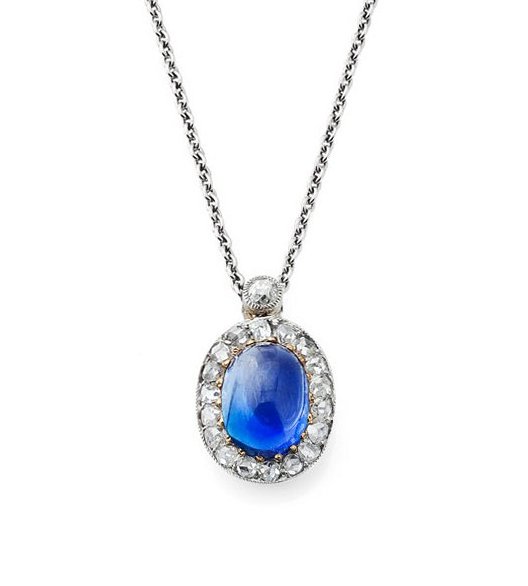 An early 20th century sapphire and diamond set pendant with chain