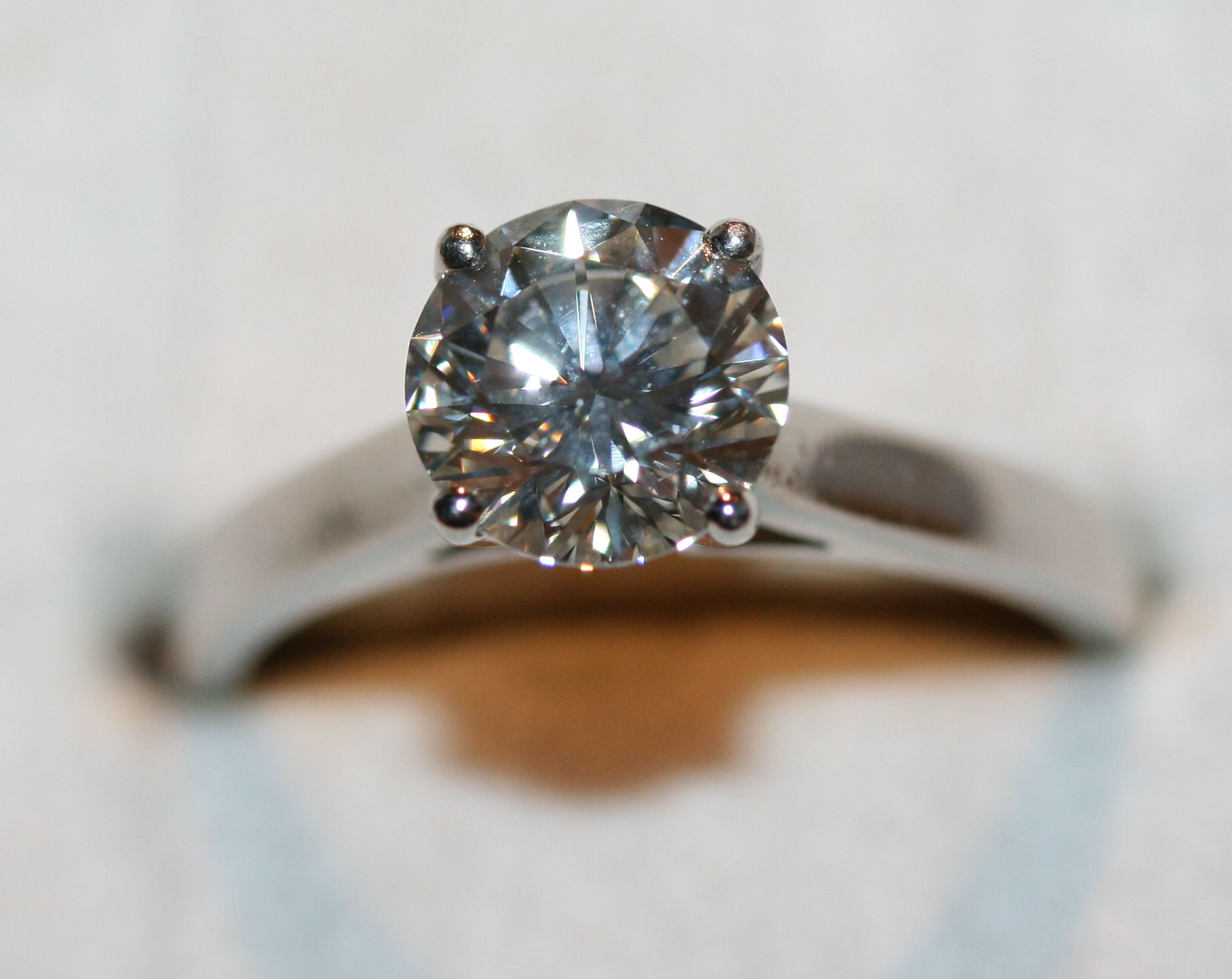 A platinum solitaire diamond ring
