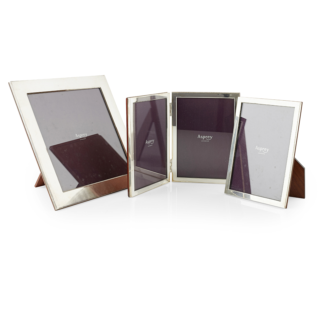 A collection of silver mounted frames, Asprey