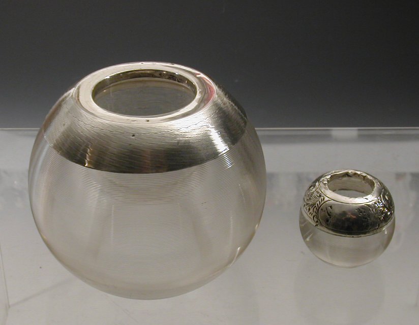 A large Edwardian silver mounted glass striker