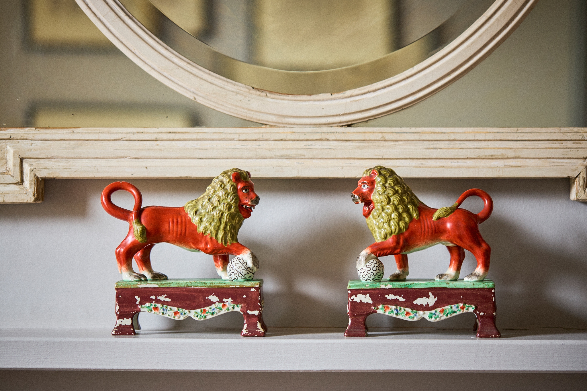 PAIR OF PEARLWARE FIGURES OF LIONS, OF SHERRATT TYPE