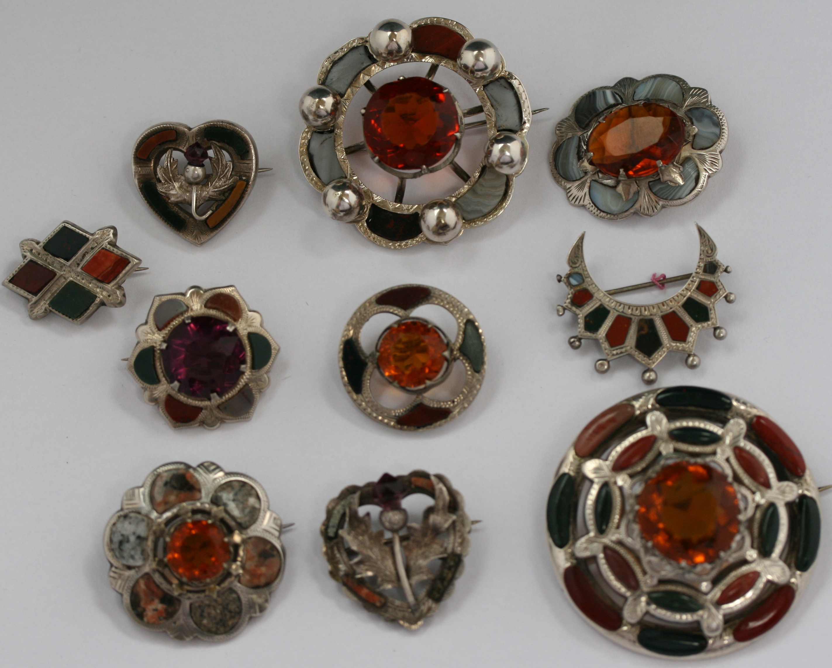 A group of ten Scottish brooches