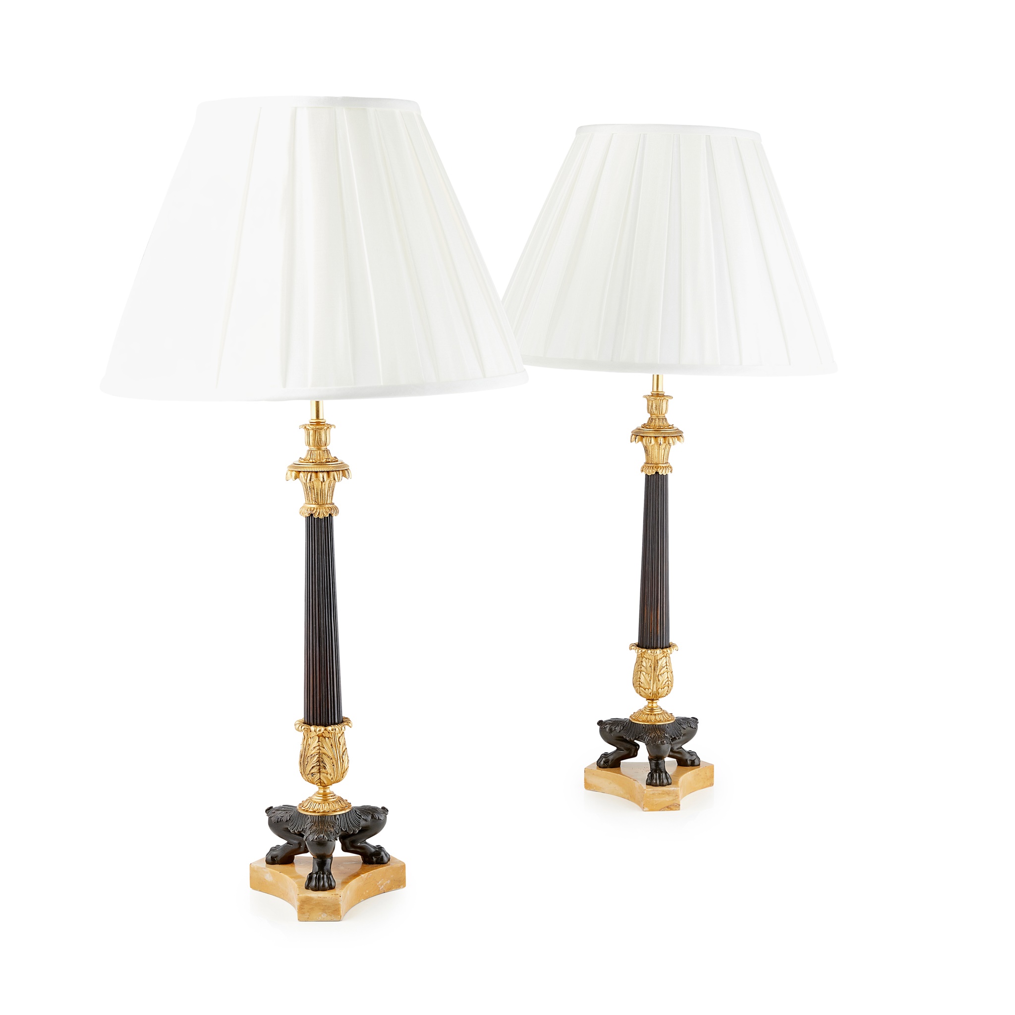 PAIR OF REGENCY PATINATED AND GILT BRONZE CANDLESTICK LAMPS