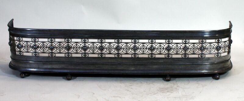 A Georgian pierced steel fender