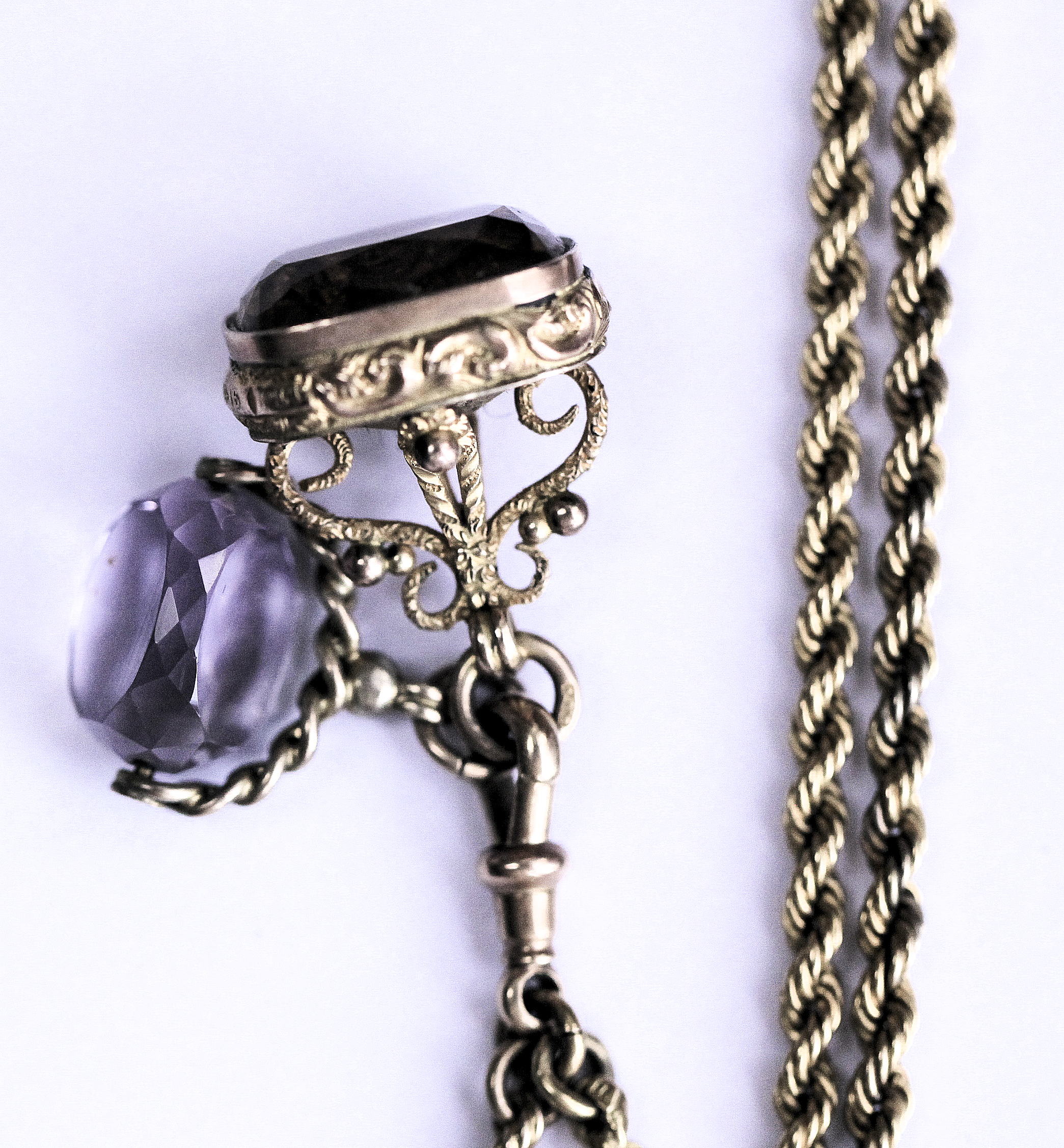 A long gold guard chain