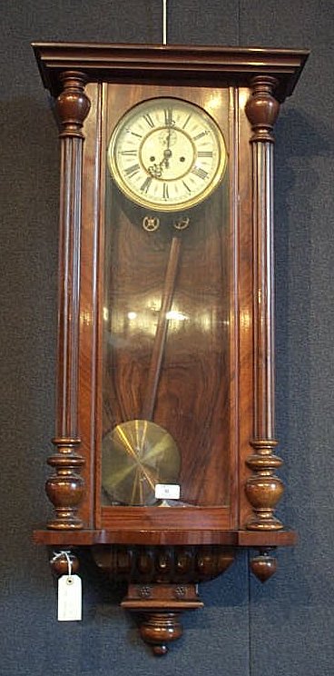 A Victorian mahogany wall clock,