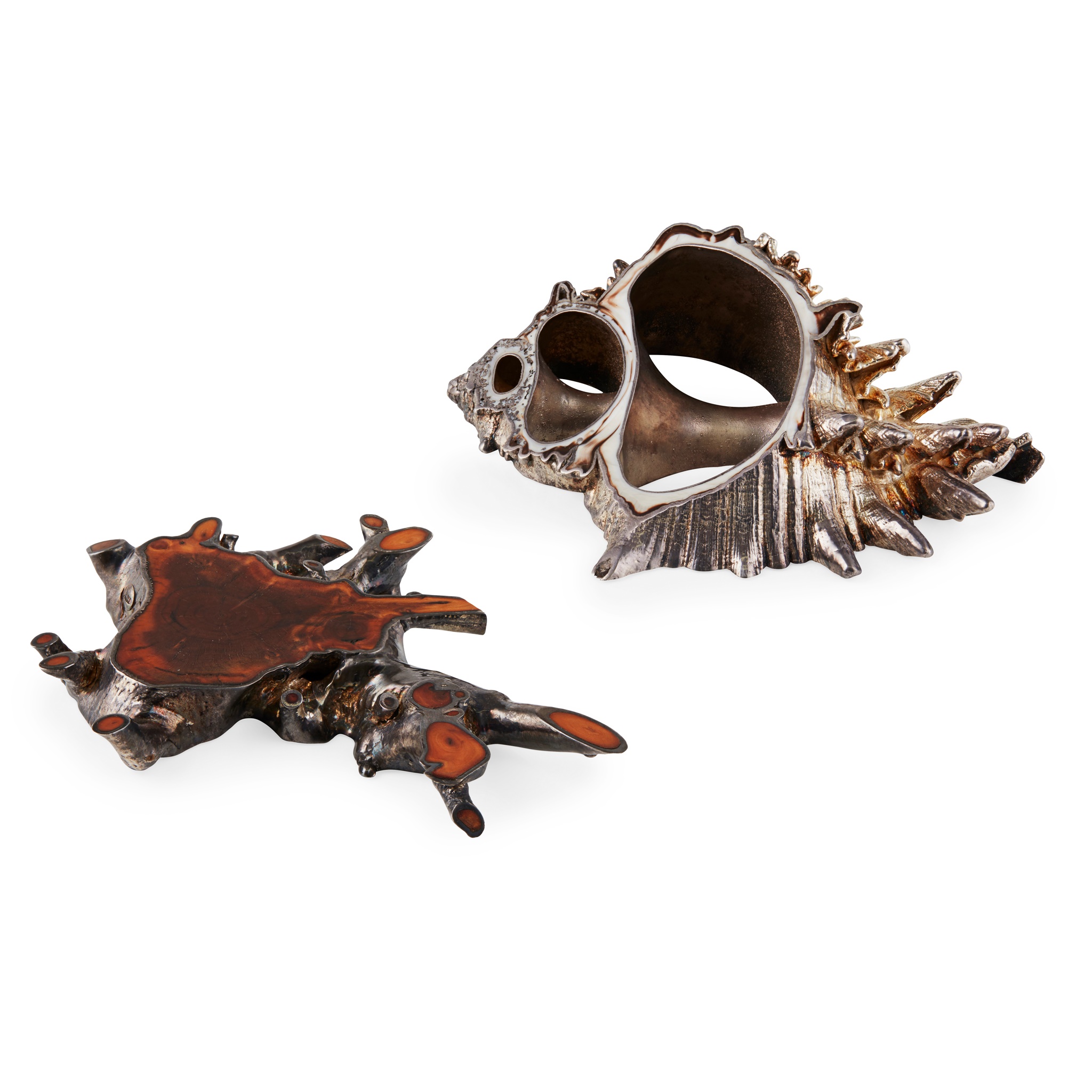 Two contemporary silver and mixed material table sculptures