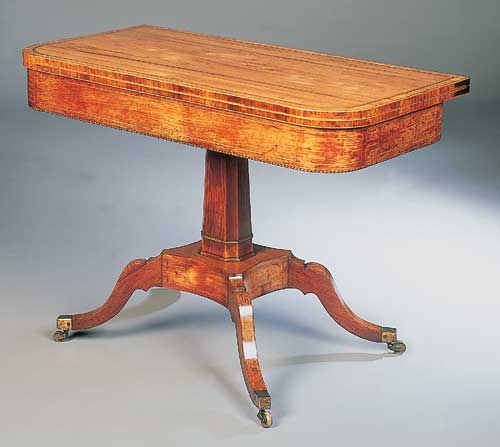 A Regency rosewood foldover tea table