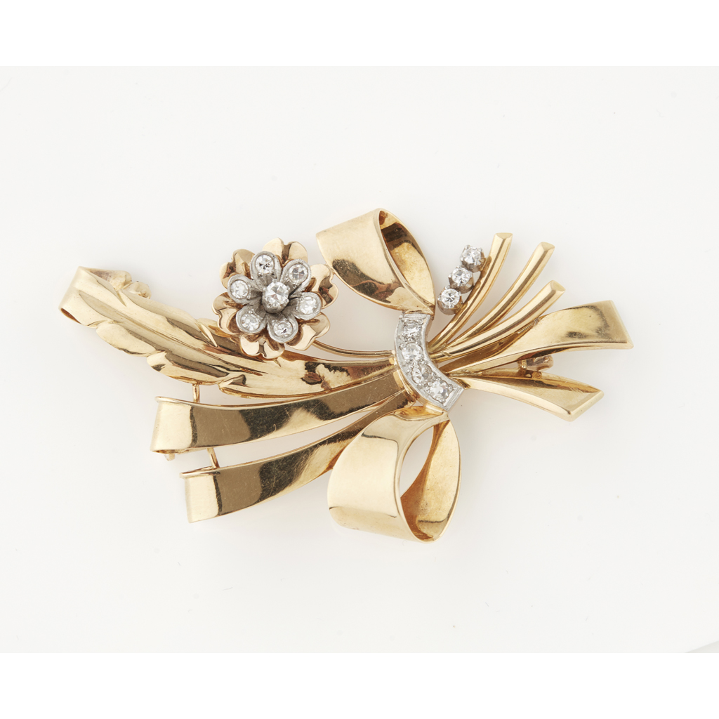 A mid-20th century diamond set floral brooch