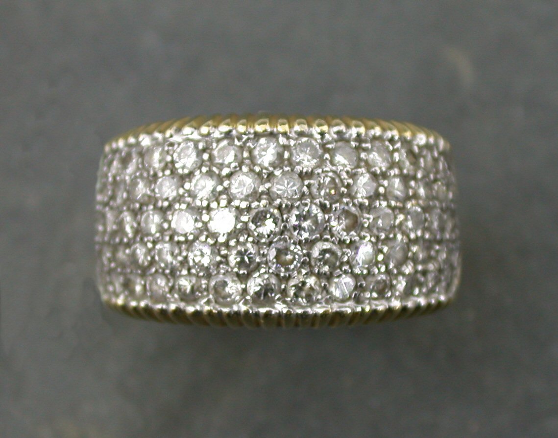 An 18ct gold all diamond cluster ring,