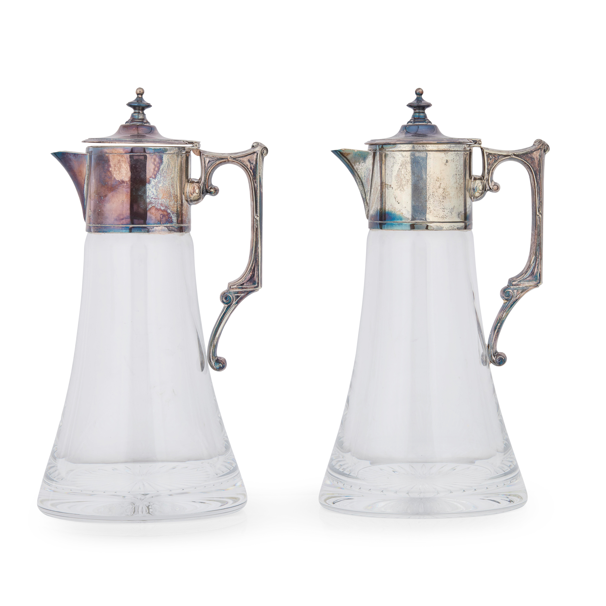 A PAIR OF 2000s CLARET JUGS
