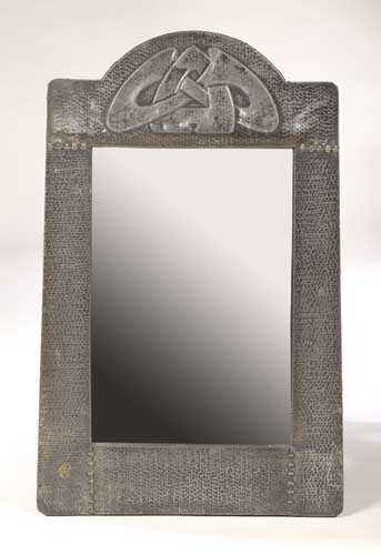 A Liberty & Co. pewter wall mirror designed by Archibald Knox, circa 1902,