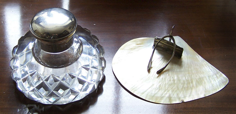 A large cut glass and silver mounted inkwell