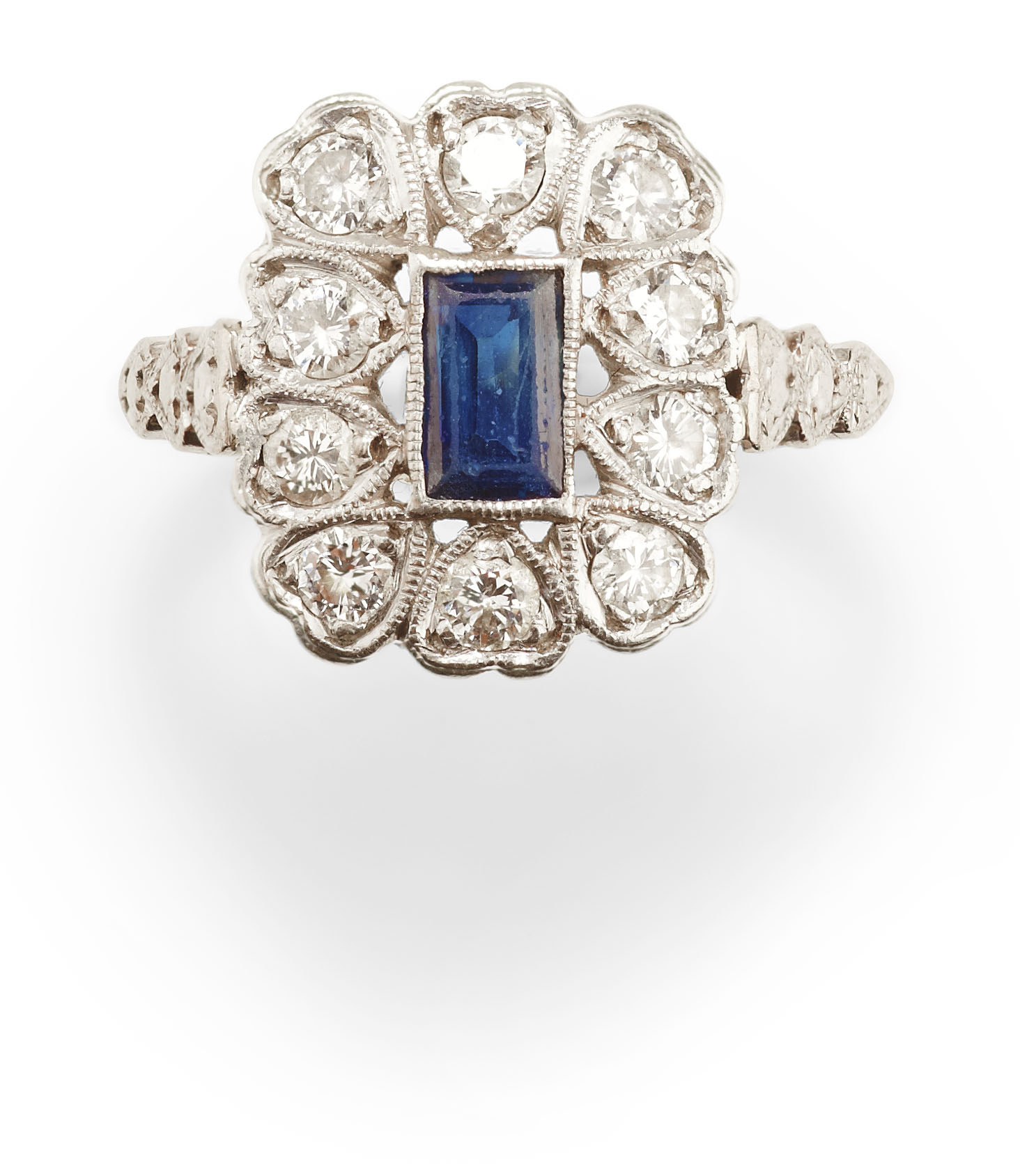 An 18ct gold and platinum diamond and sapphire ring