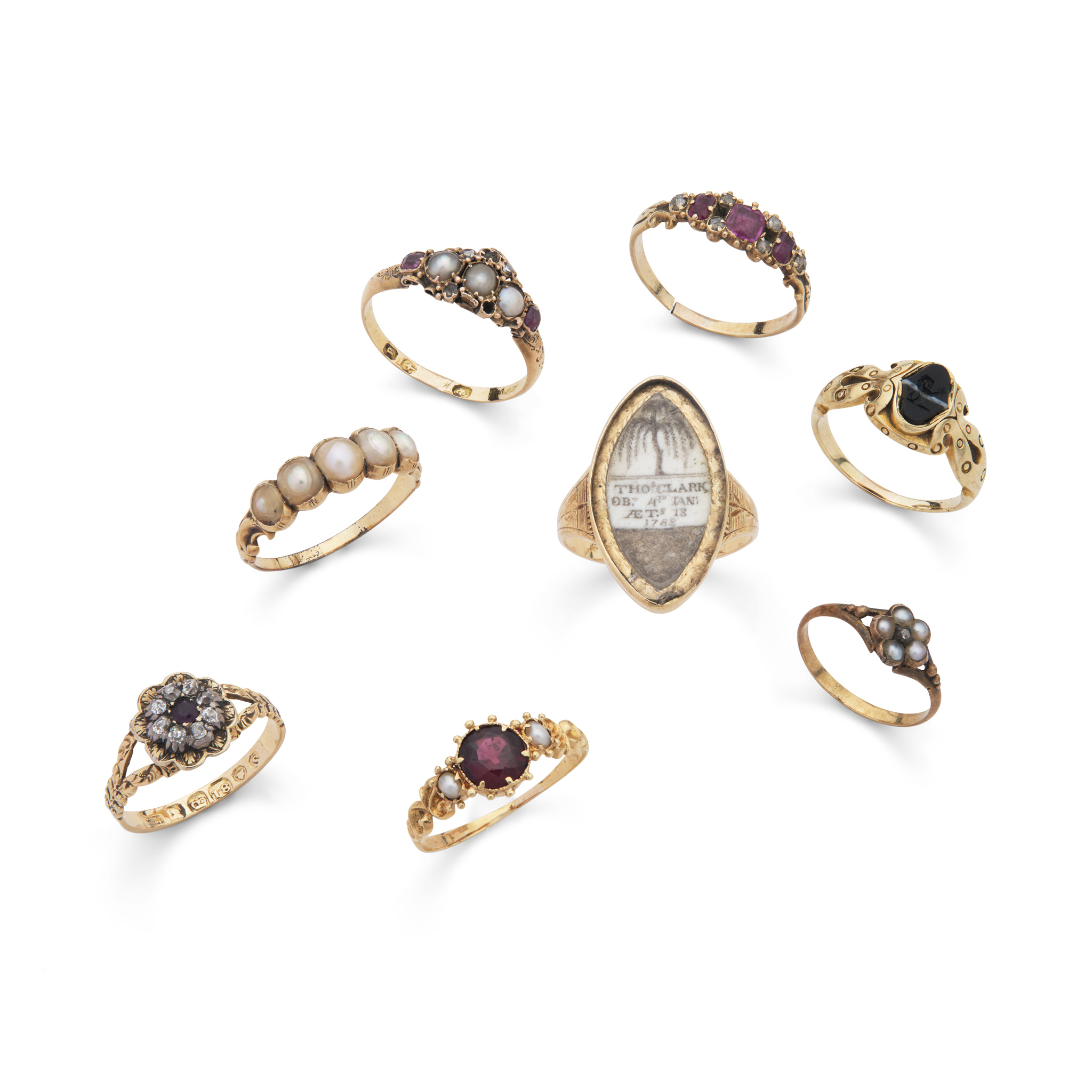 A collection of eight gem-set rings