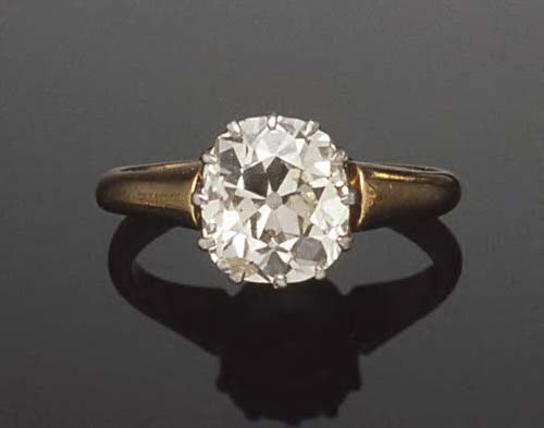 An 18ct gold mounted diamond single-stone ring,