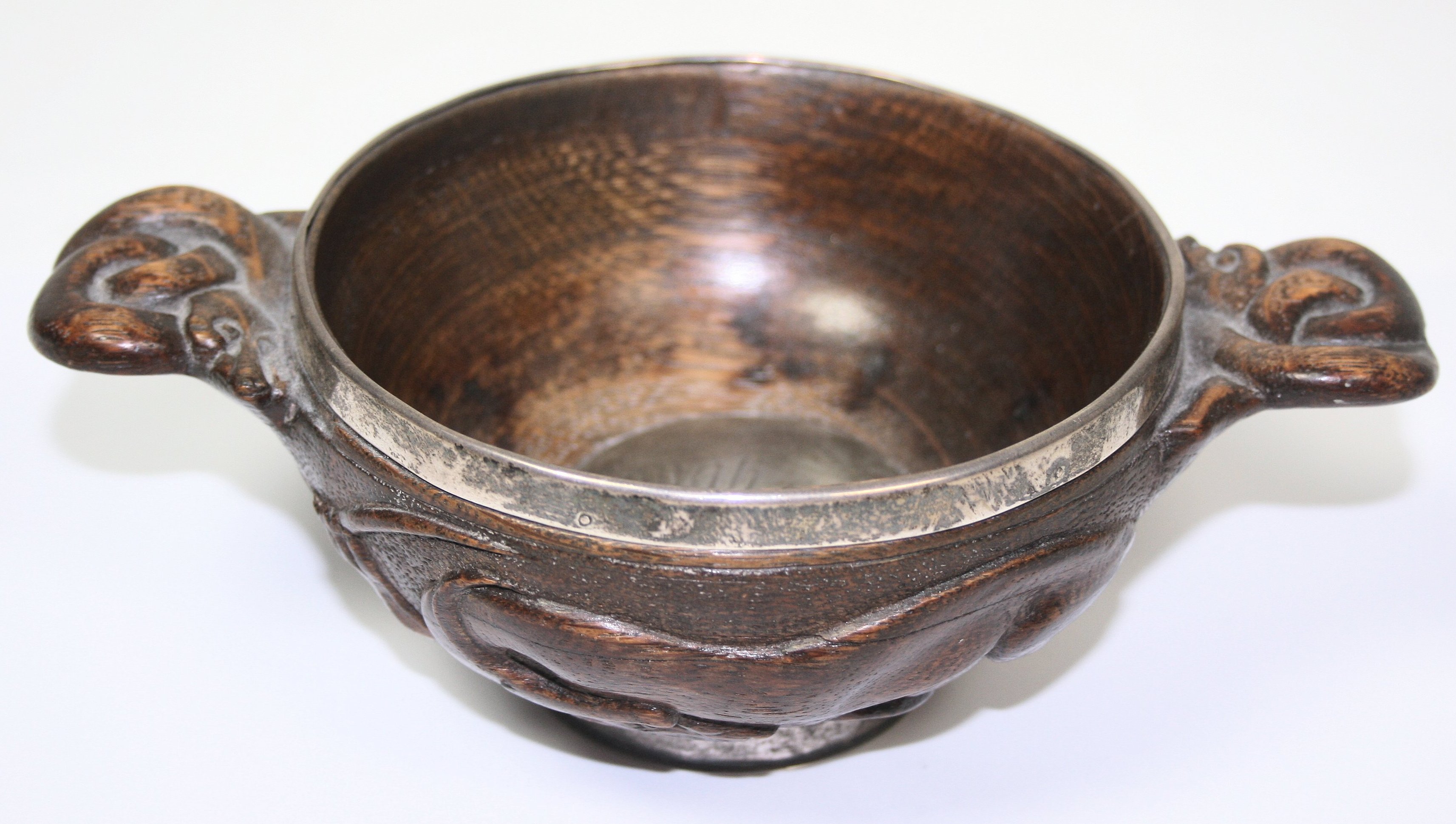Inverness - a Scottish provincial carved a wooden and silver mounted quaich