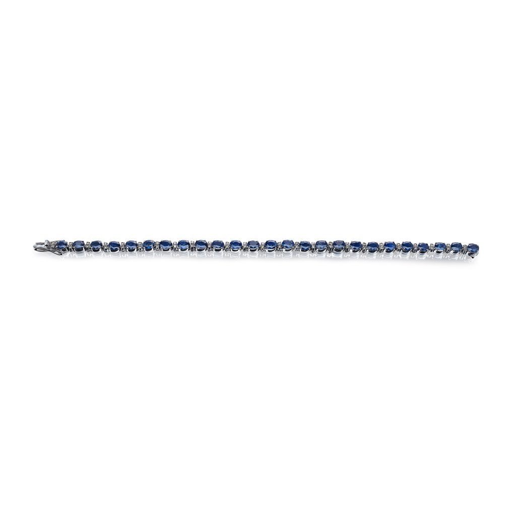 A sapphire and diamond set line bracelet