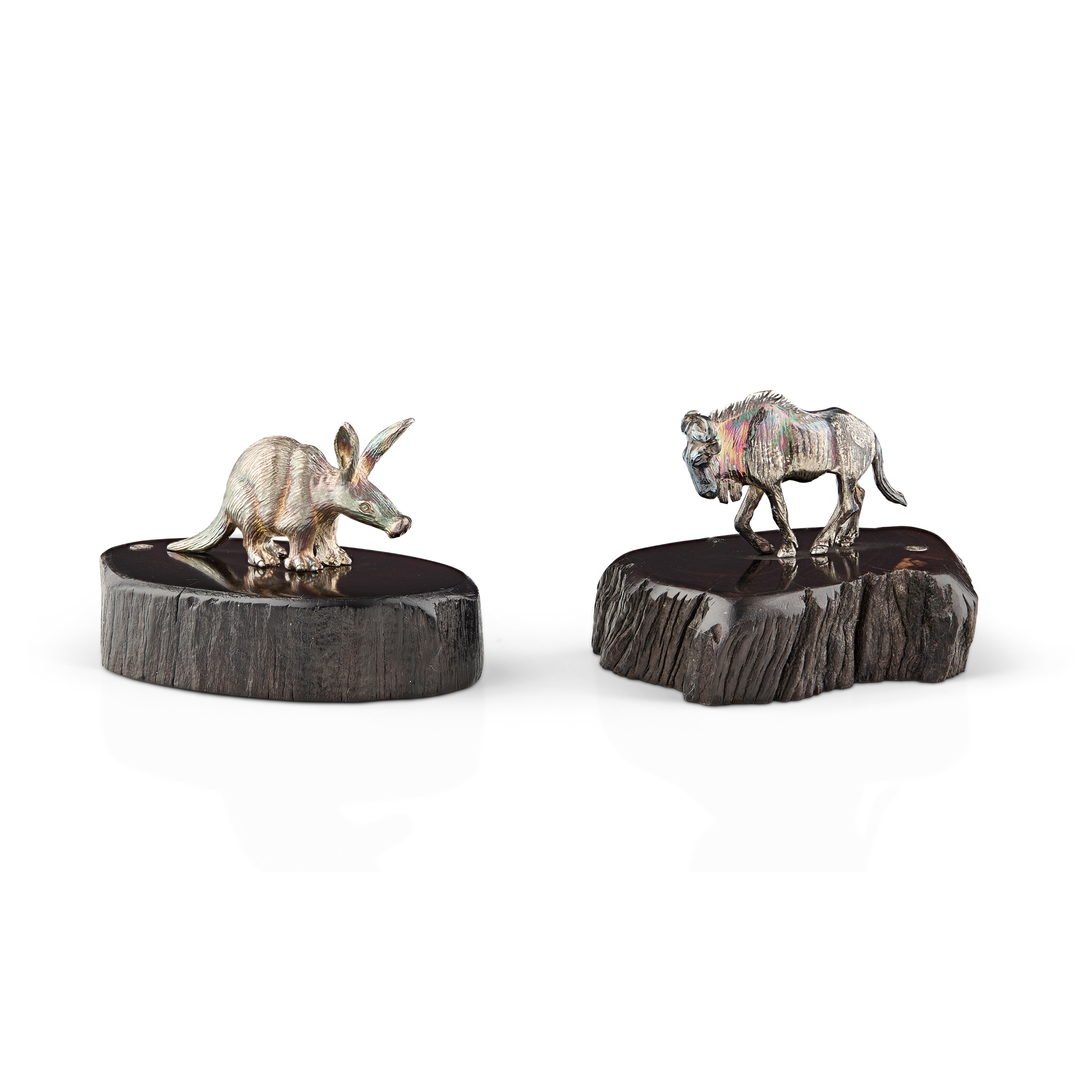A SET OF TWO CONTEMPORARY WILDEBEEST AND AARDVARK SCULPTURES