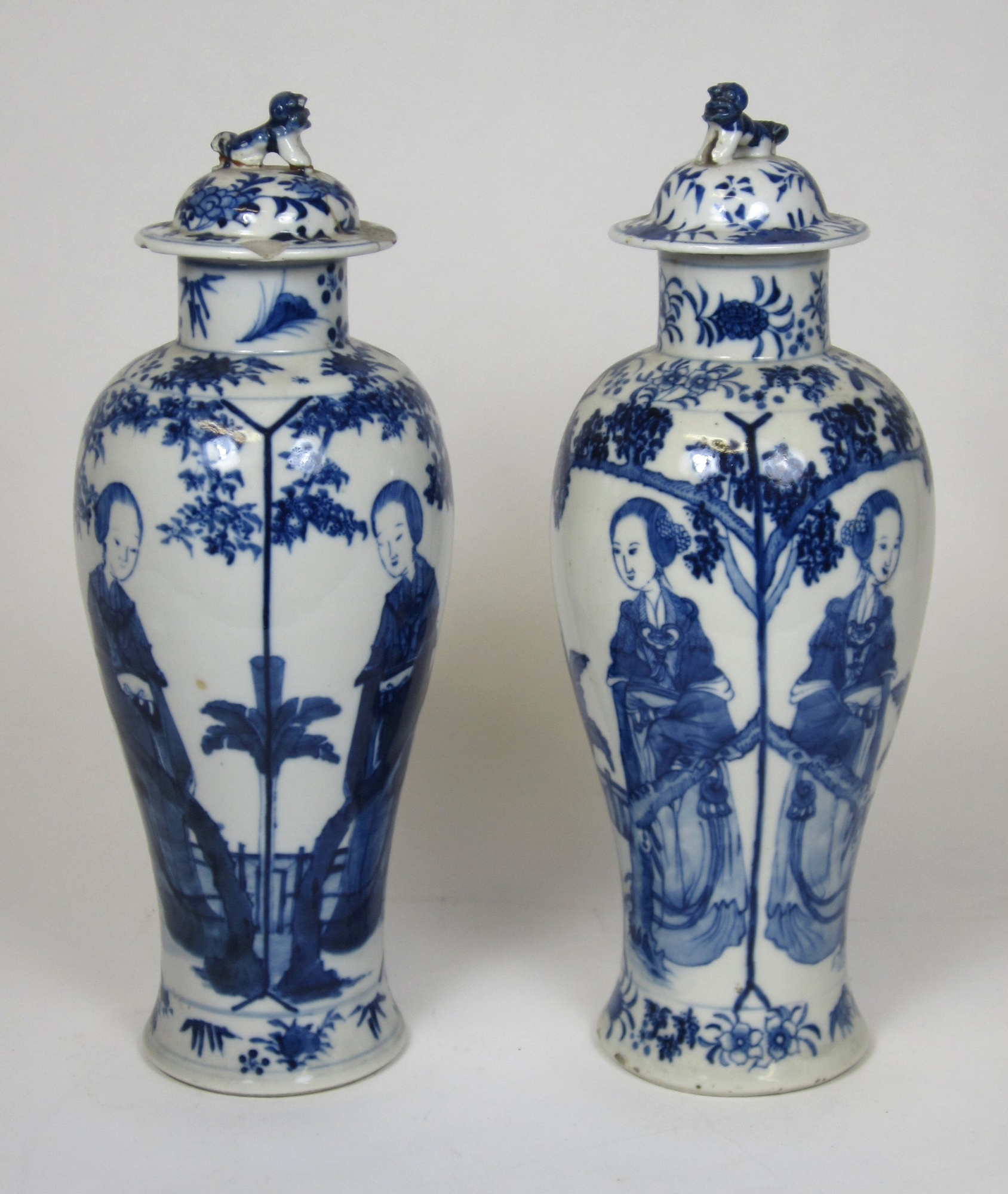 PAIR OF CHINESE BLUE AND WHITE PORCELAIN VASES AND COVERS