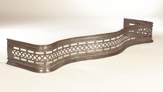 A 19th century serpentine steel fender