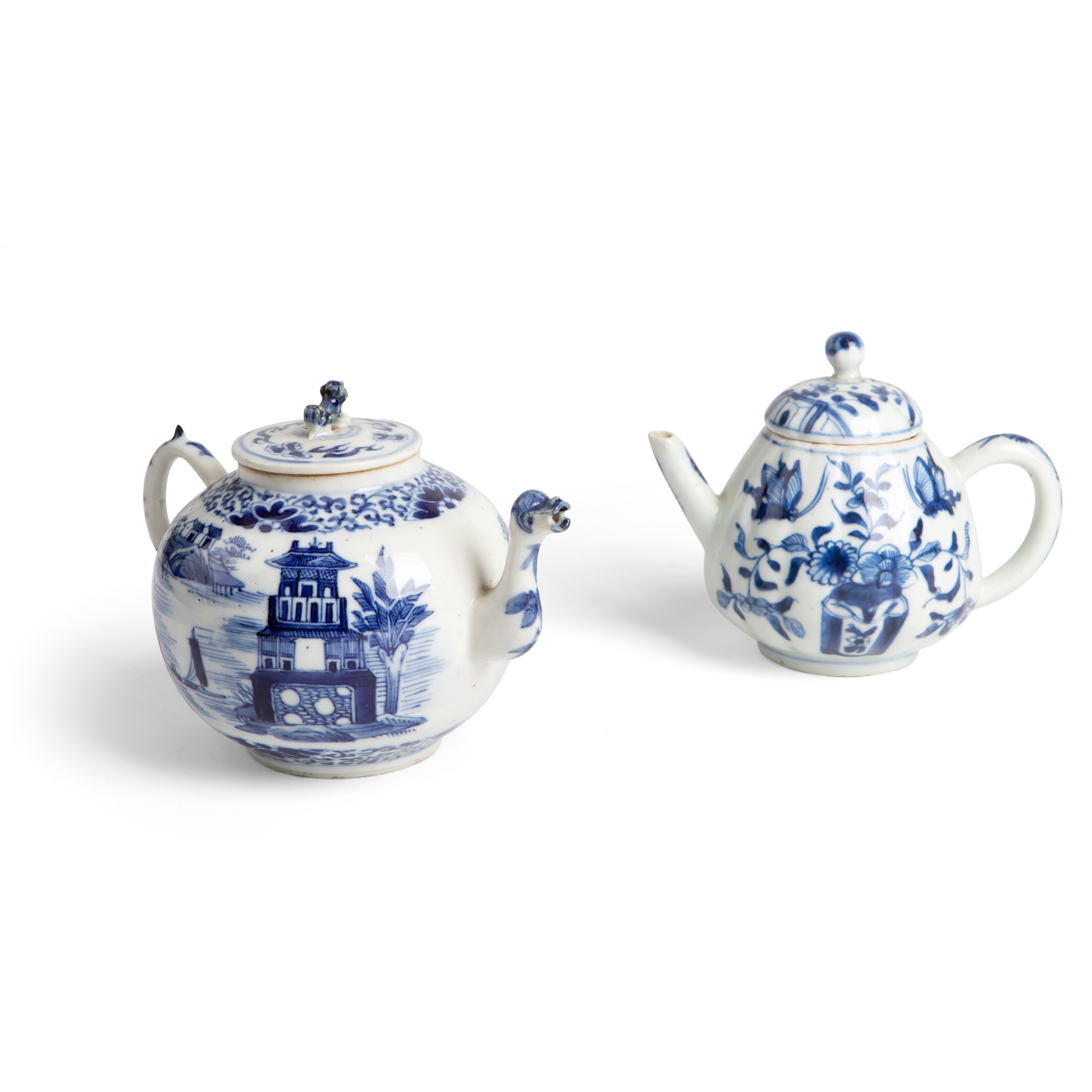 TWO BLUE AND WHITE TEAPOTS WITH LIDS