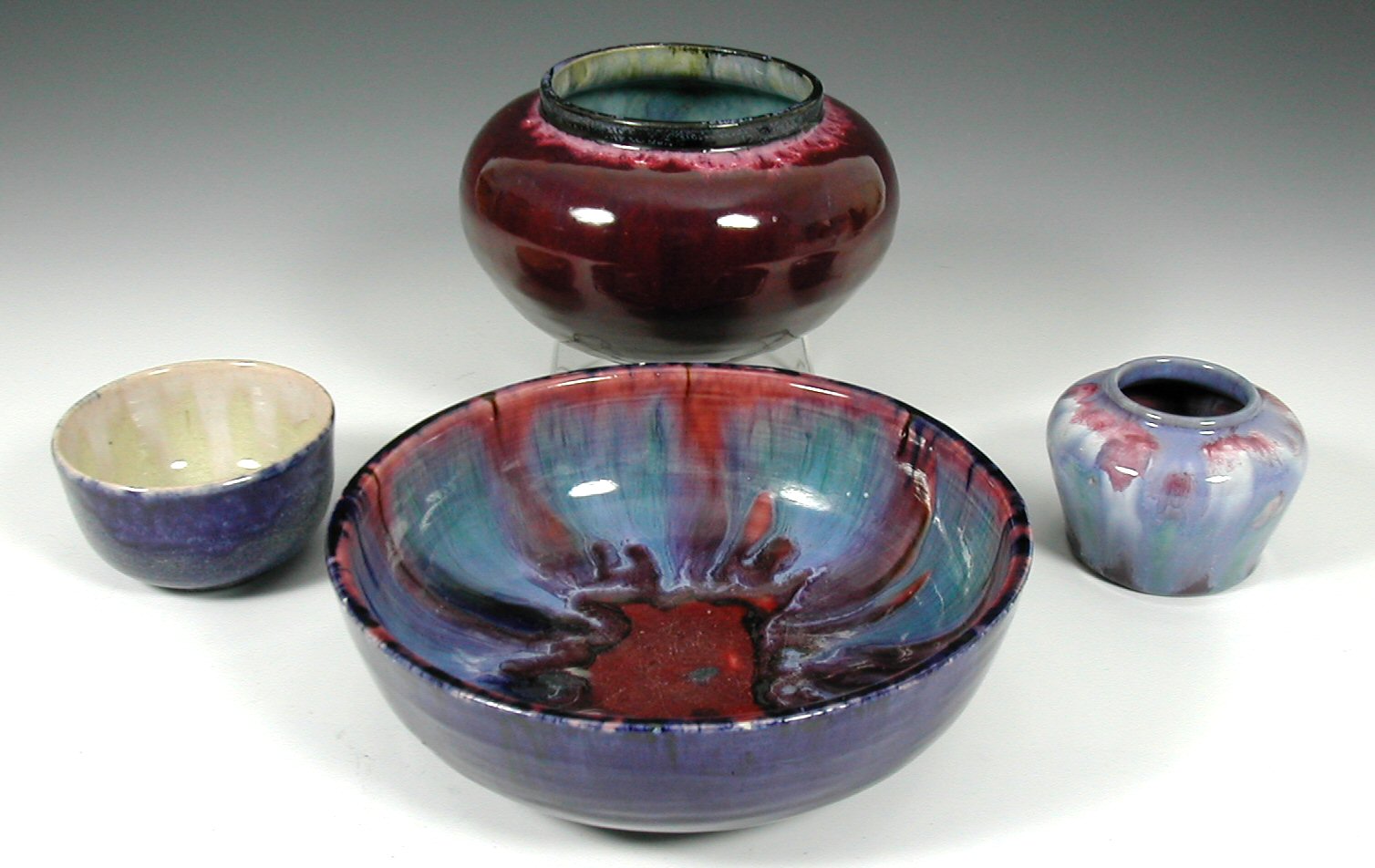 A group of four Allander pottery bowls and vases,