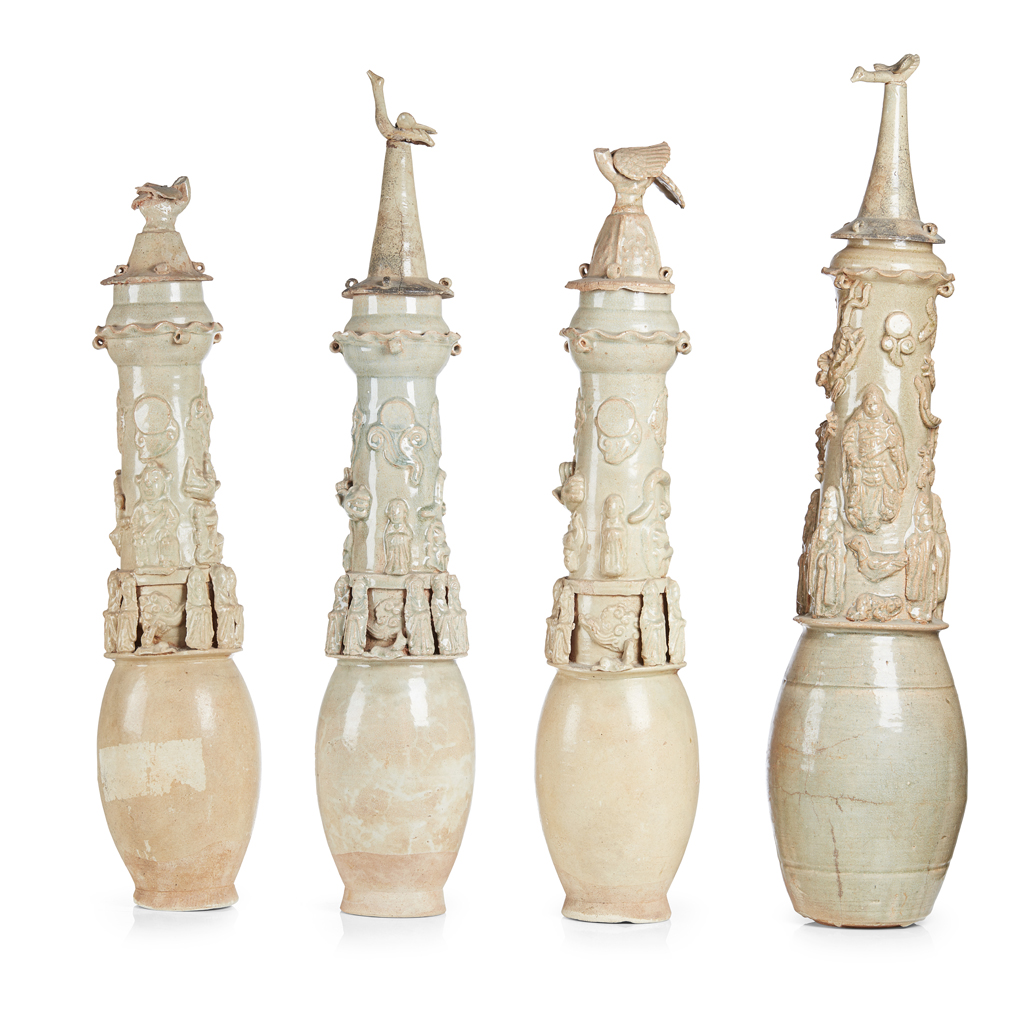 FOUR QINGBAI GLAZED FUNERARY URNS AND LIDS