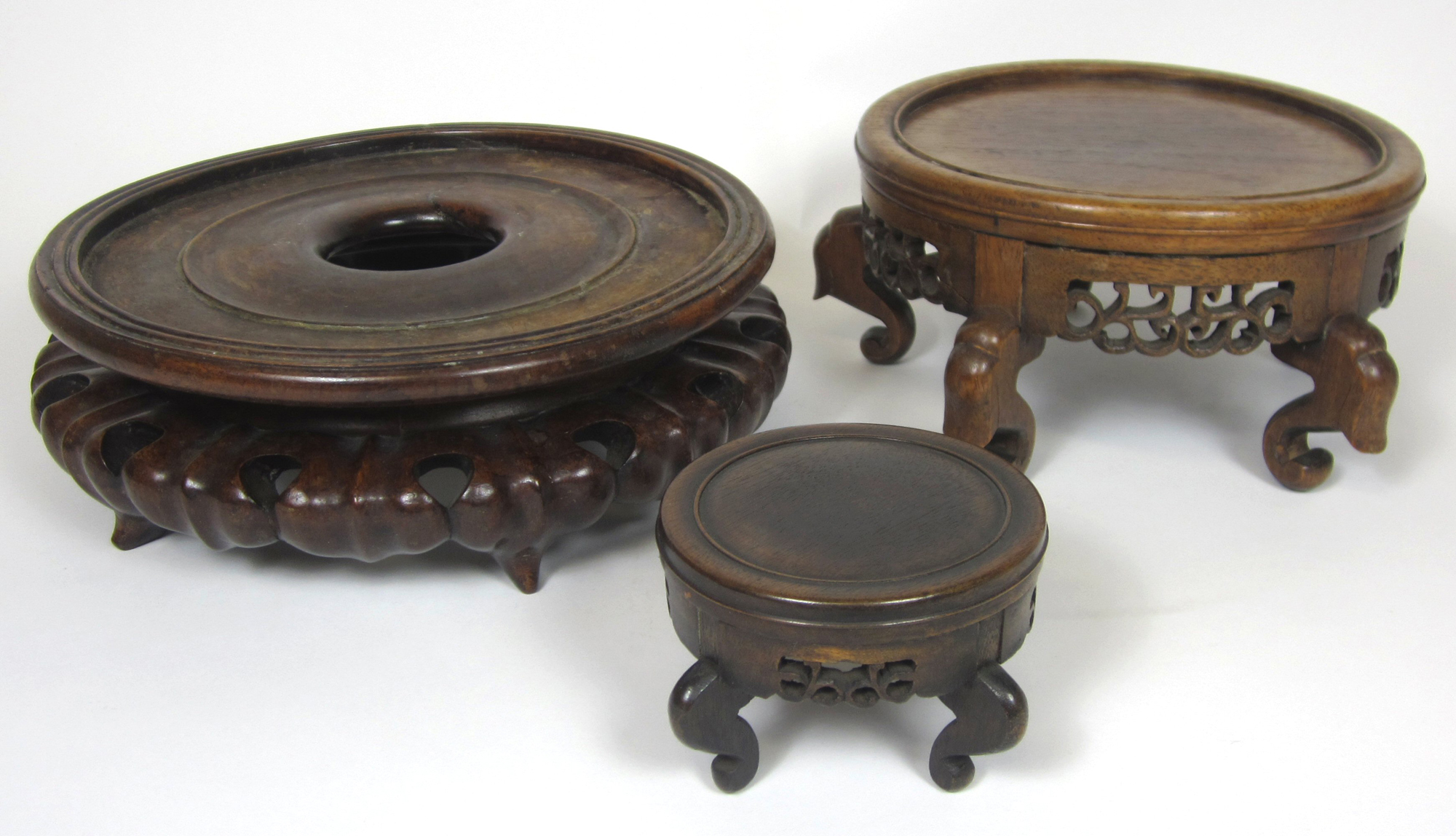 COLLECTION OF ORIENTAL CARVED HARDWOOD STANDS