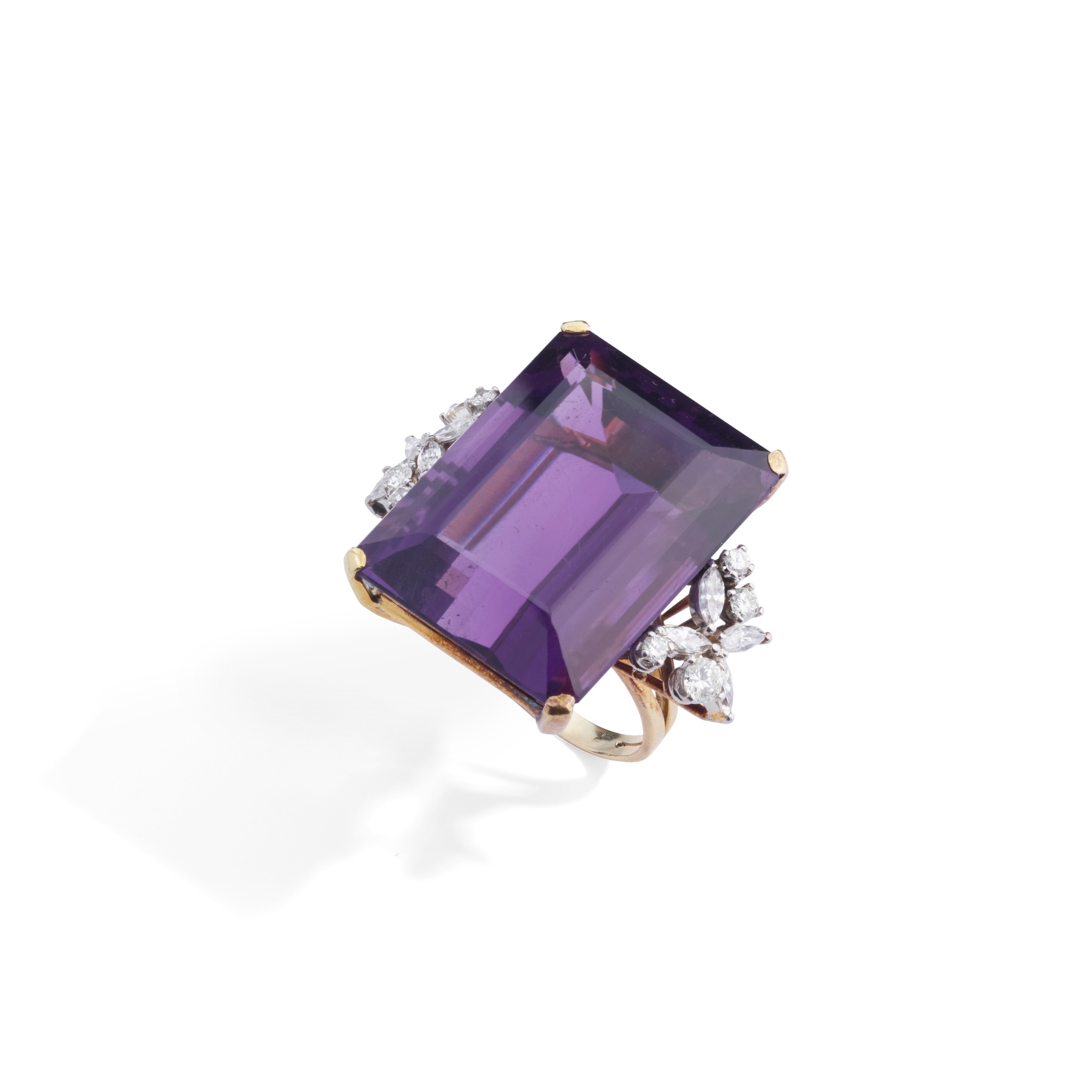 An amethyst and diamond dress ring
