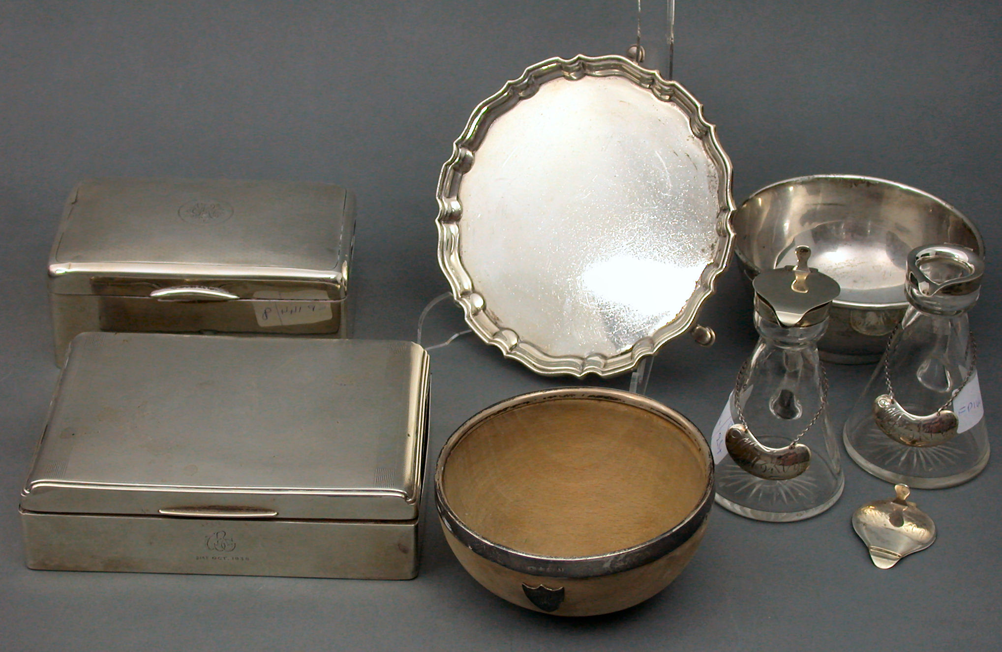 A pair of mounted glass whisky decanters,