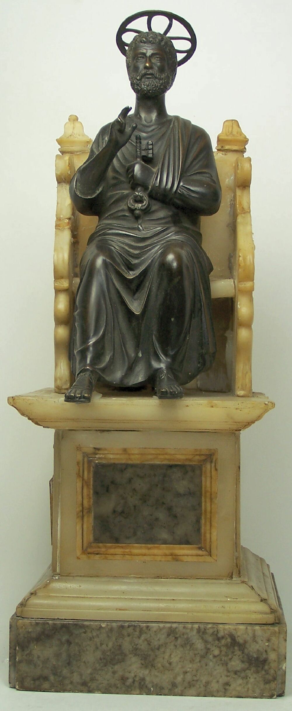 A late 19th Century carved alabaster and bronze figure