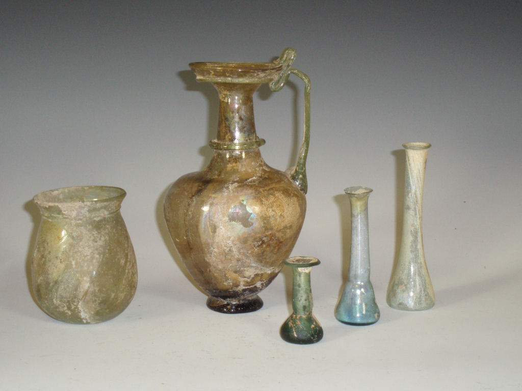 A Roman translucent purple glass jug