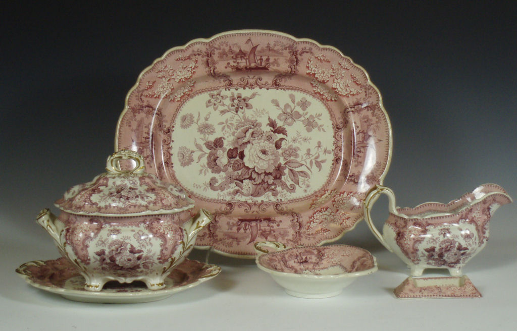 A large 19th century pink transfer printed Shiraz pattern dinner service