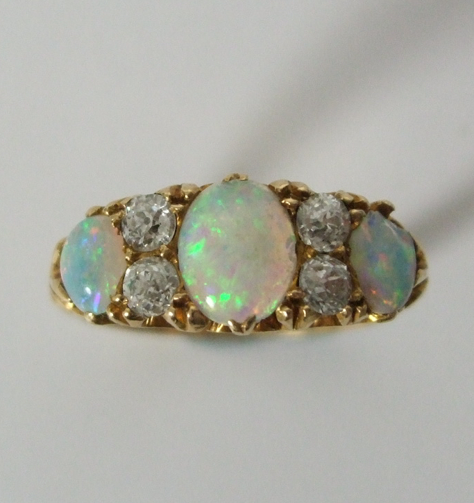 A diamond and opal cluster ring