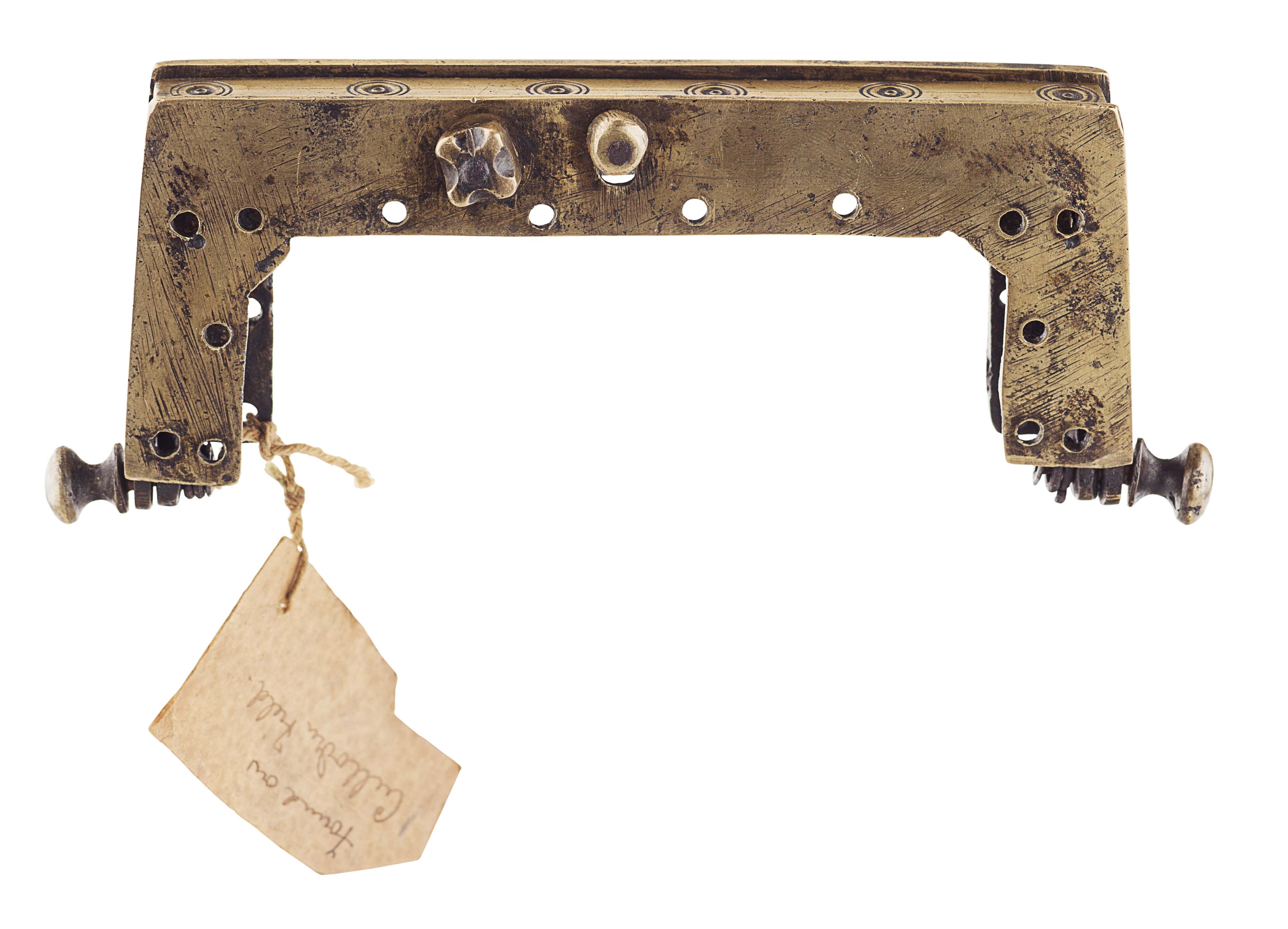 A mid 18th century brass sporran cantle