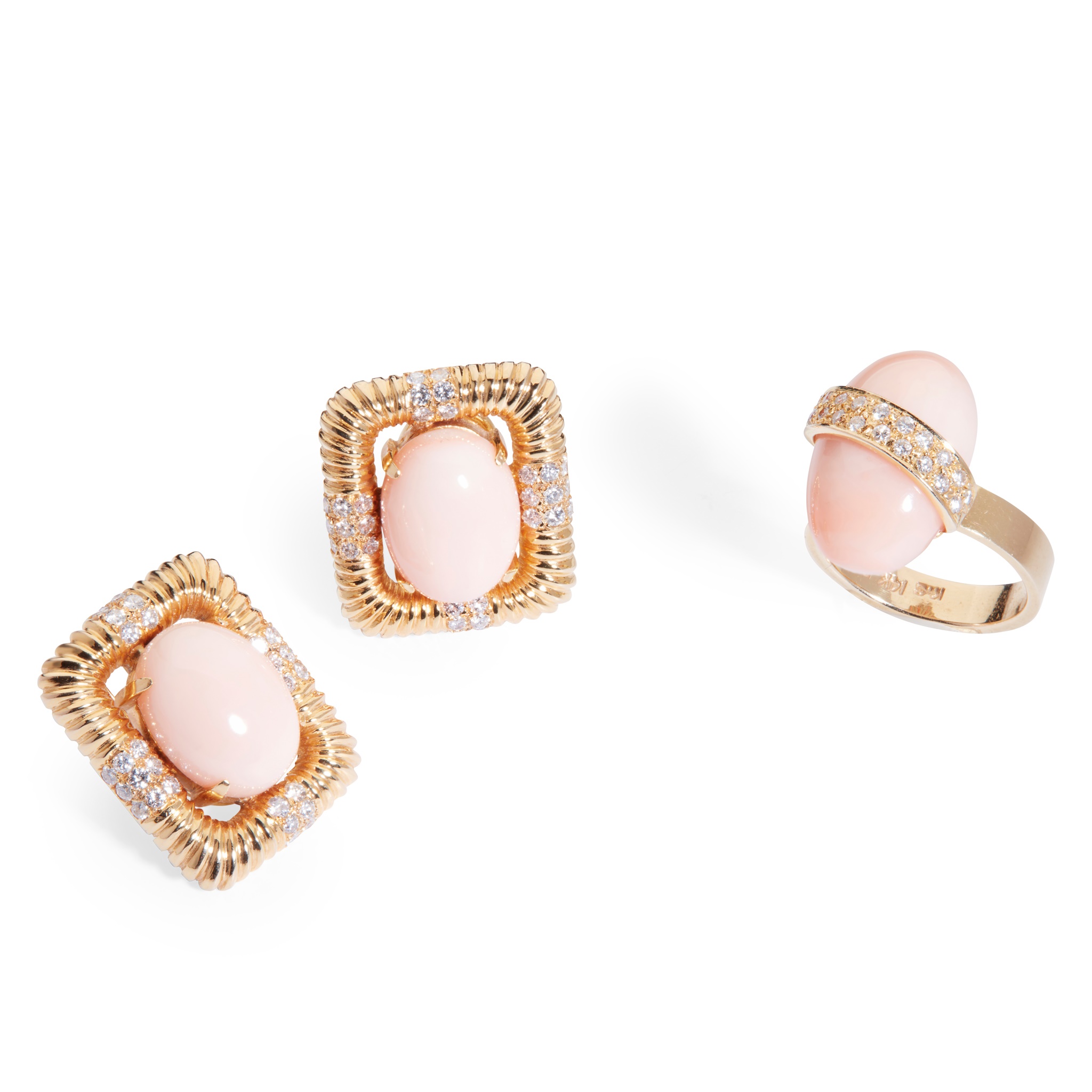 A pair of coral and diamond earrings